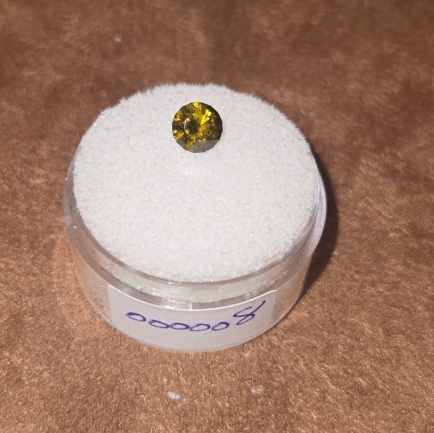 Demantoid Garnet  Valuation Report 157933, 0.80 cts.