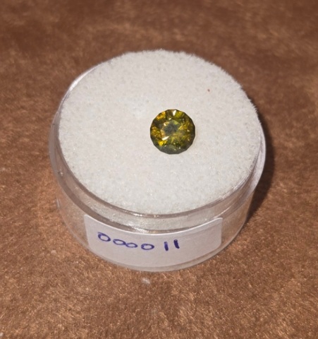 Demantoid Garnet  Valuation Report 157936, 0.85 cts.