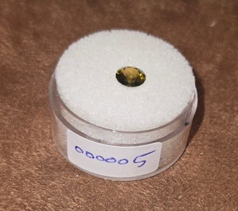 Demantoid Garnet  Valuation Report 157930, 0.86 cts.