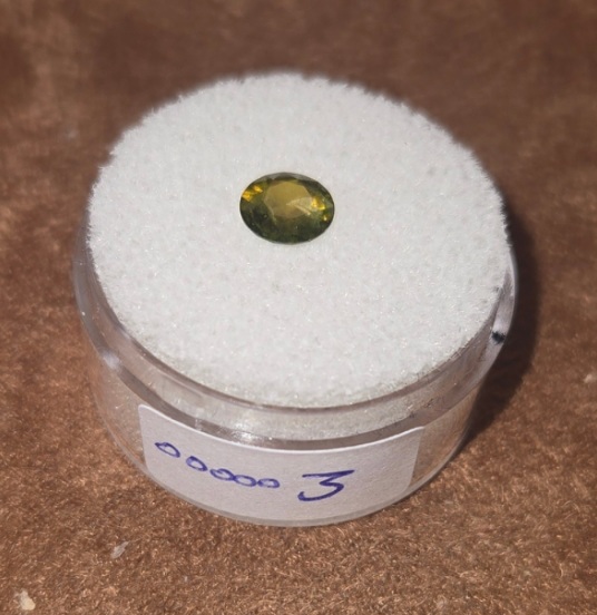 Demantoid Garnet  Valuation Report 157928, 0.90 cts.