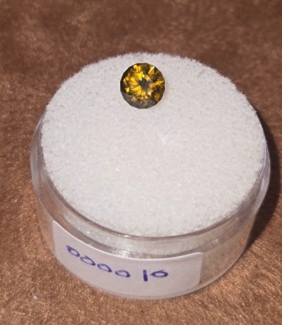 Demantoid Garnet  Valuation Report 157934, 0.78 cts.