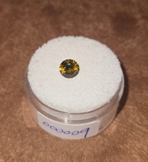 Demantoid Garnet  Valuation Report 157935, 0.80 cts.