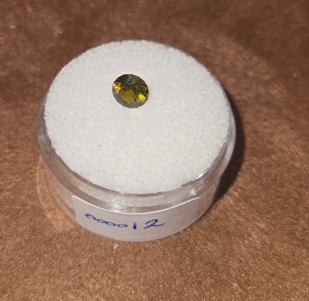 Demantoid Garnet Valuation Report 157937, 0.69 cts.