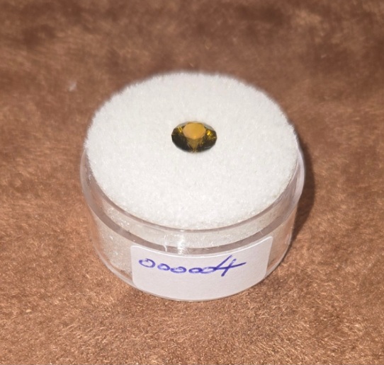 Demantoid Garnet  Valuation Report 157929, 0.88 cts.